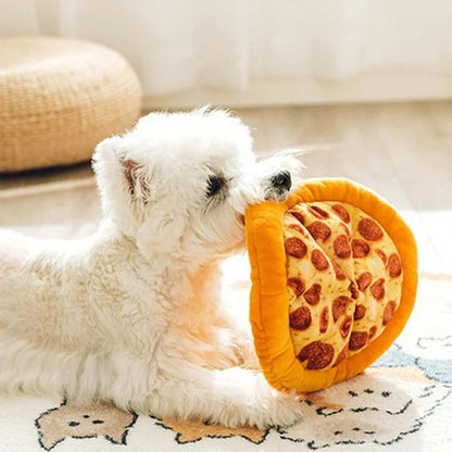 DogJoy un chien blanc joue avec un jouet chien coussin pizza